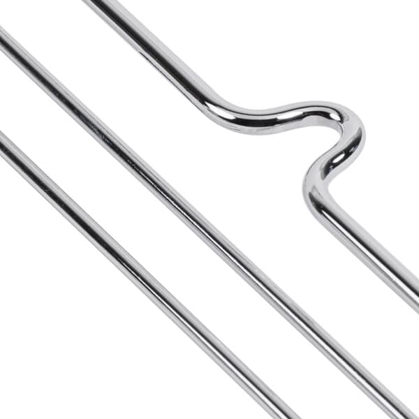 A pair of silver plated metal hooks with several metal rods.