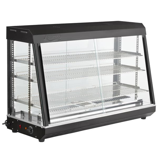 An Avantco countertop heated display case with sliding glass doors on a counter.