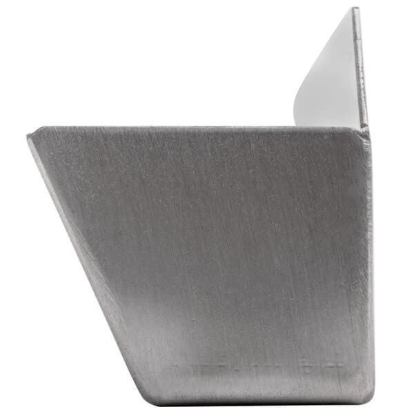 A close-up of a silver metal container with a handle.