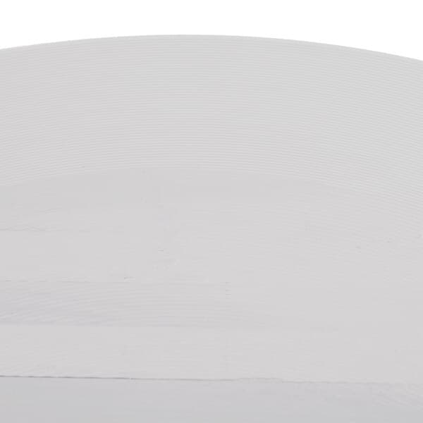 A white surface with a curved edge and a few lines.