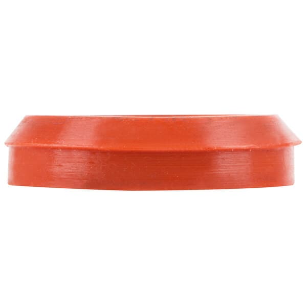 An orange plastic screw gasket for a faucet.