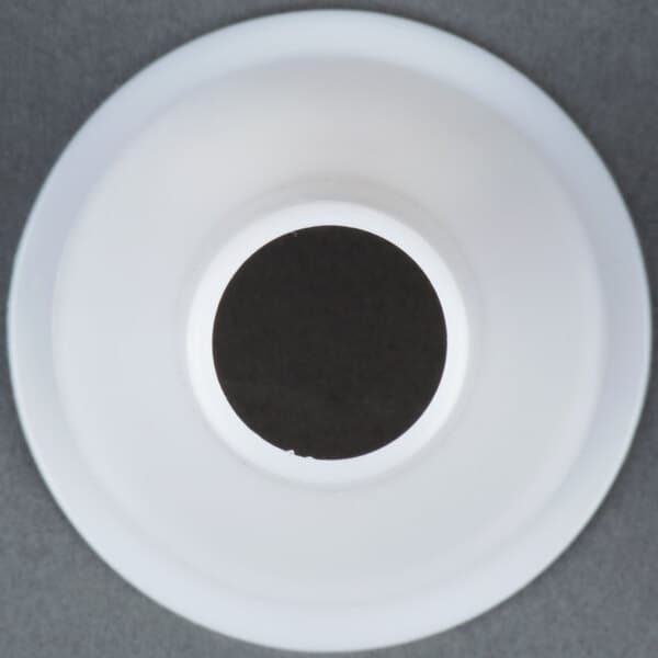 A white plastic sausage stuffer tube with a black circle at the end.