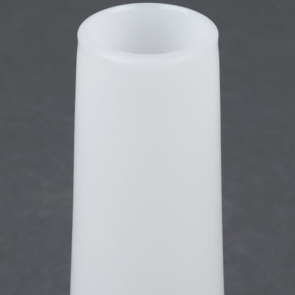 An Avantco white cylindrical sausage stuffer tube with a black handle on a gray surface.