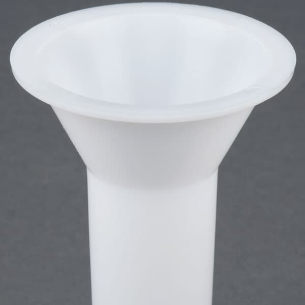 A white plastic sausage stuffer funnel.