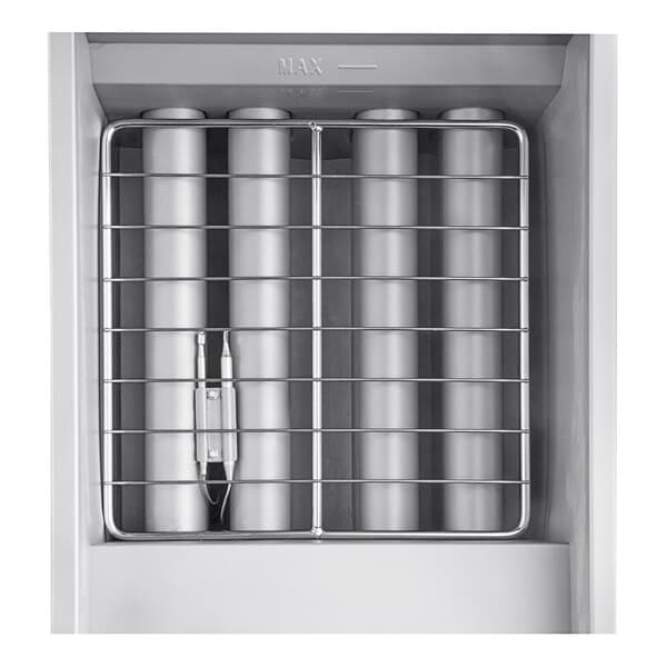 An Avantco stainless steel floor fryer with a metal rack holding cylindrical objects inside.