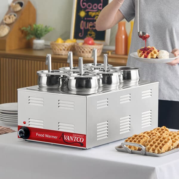 A stainless steel Avantco electric countertop food warmer and topping station with six 2.5-quart inset pots and ladles.