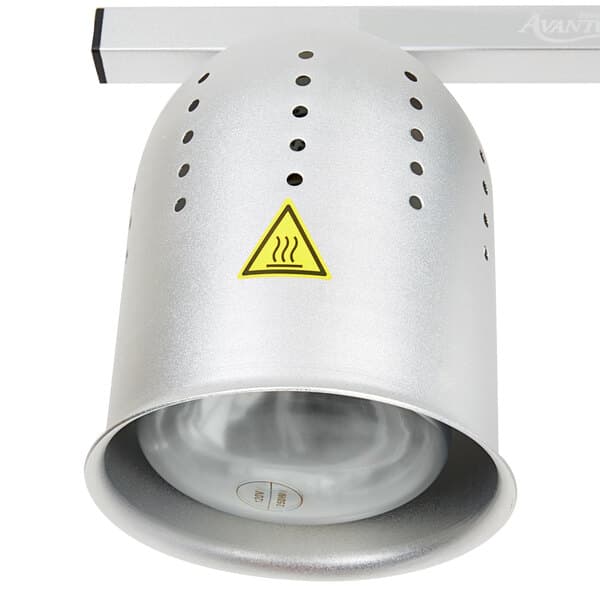 A silver metal Avantco countertop heat lamp with red bulbs over food.