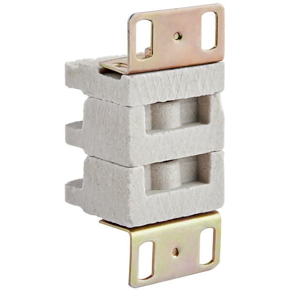 A close-up of a white terminal block with metal brackets.