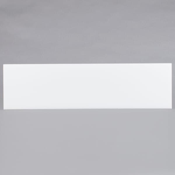 A white rectangular object with a black border.
