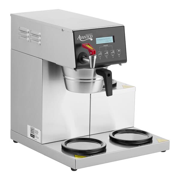 A digital automatic coffee maker with three lower decanter warmers.