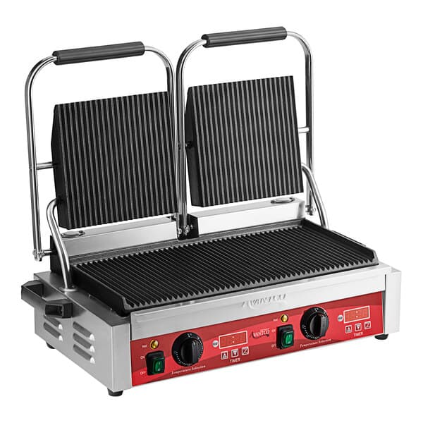 An Avantco commercial dual panini sandwich grill on a table.