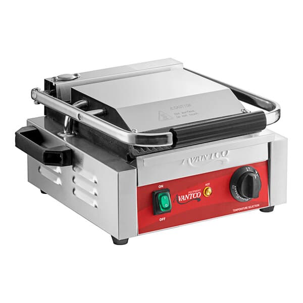 An Avantco commercial panini grill with a red and black handle.