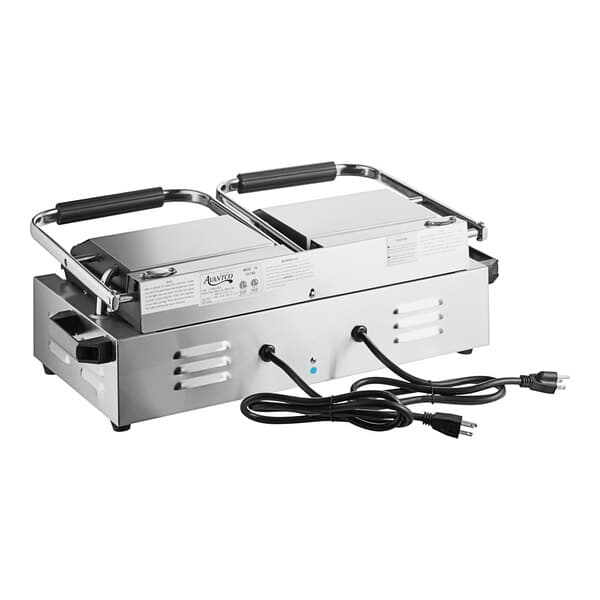 An Avantco commercial dual panini sandwich grill with two handles and wires attached.
