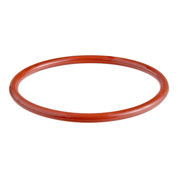 An orange oval rubber plunger seal.