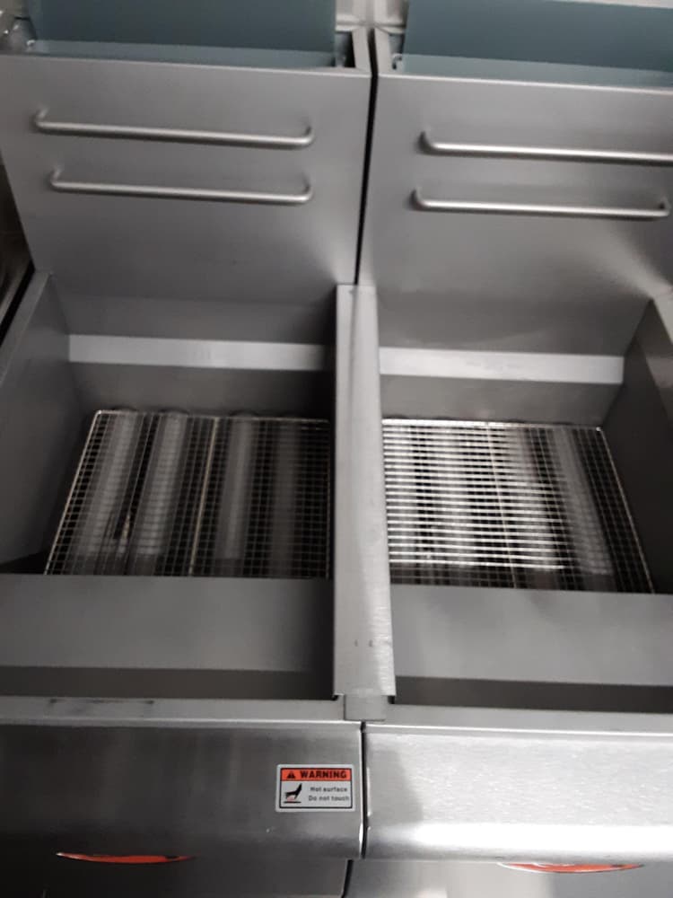This is a great addition to my food truck and makes have two deep fryers seamless and keep grease from going between the fryers.