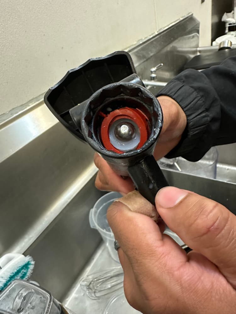 shredded gasket inside the spout