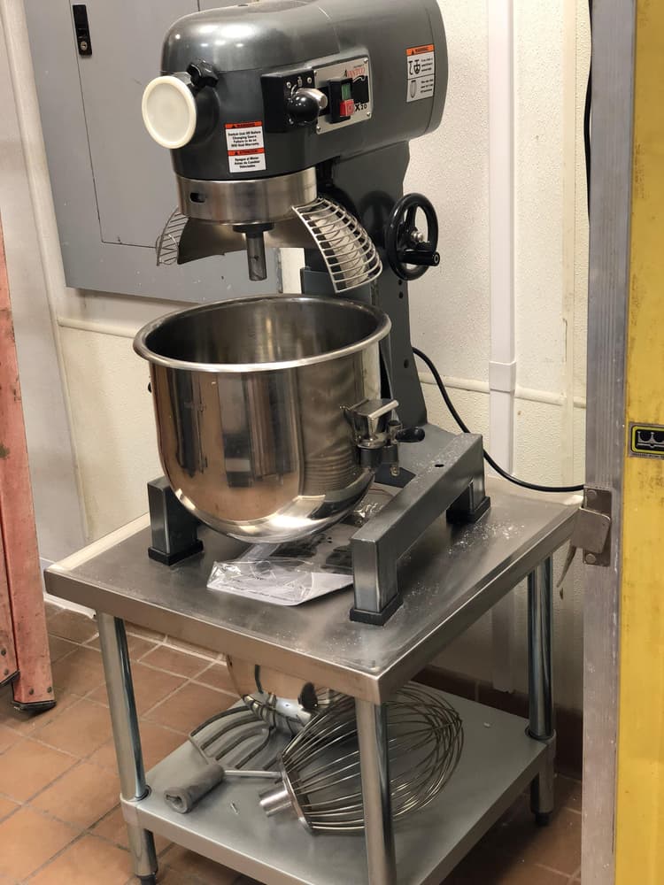 The hook reaches the bottom of my bowl. Easy to clean and has been easy to function with.