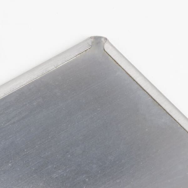 A silver metal door with a metal surface.