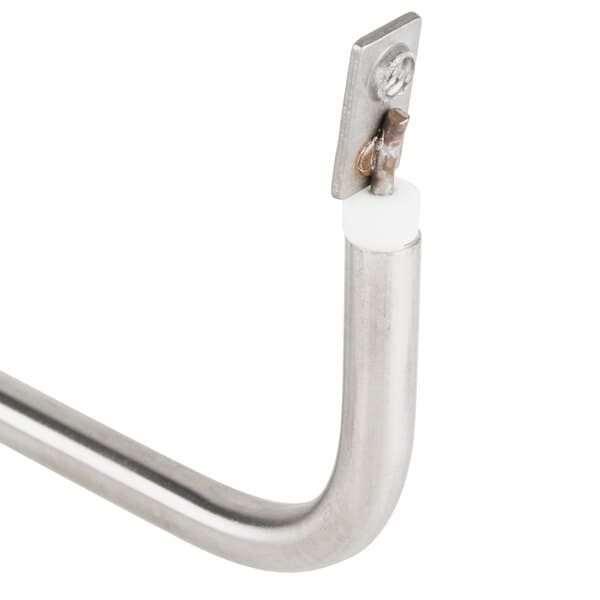 A metal pipe with a white and black metal piece on the end.