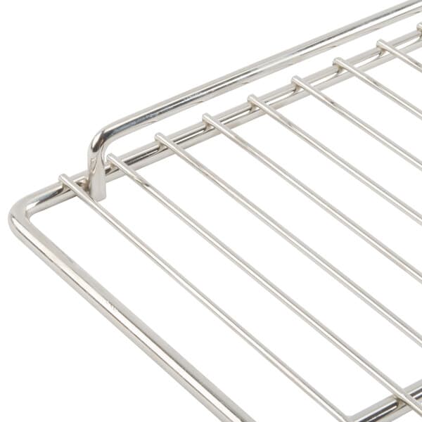 An Avantco stainless steel wire rack with a handle.