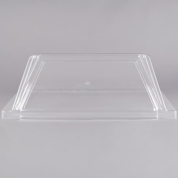 A clear plastic sneeze guard with a lid for an Avantco hot dog roller grill.