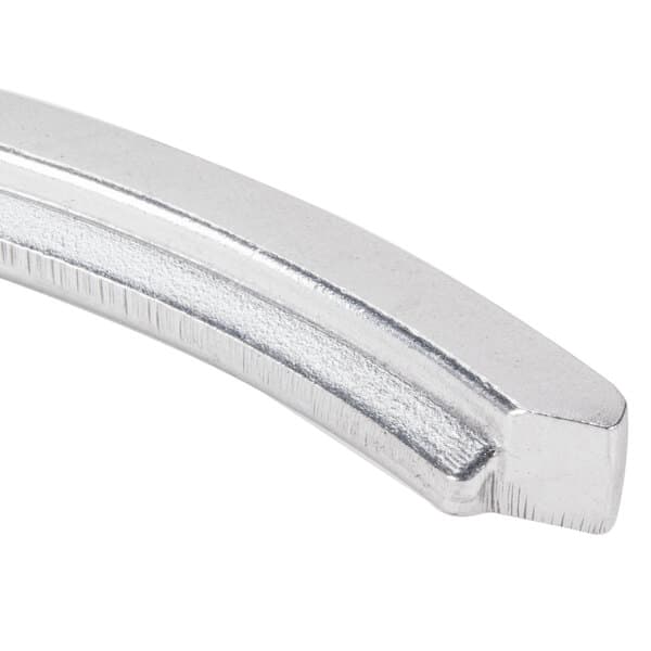 A close-up of a silver curved metal Avantco ring guard.