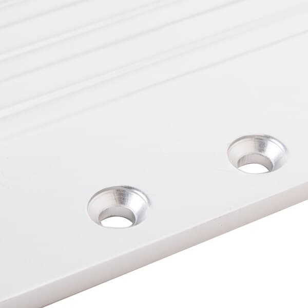 A white plastic Avantco regulator plate with two holes.