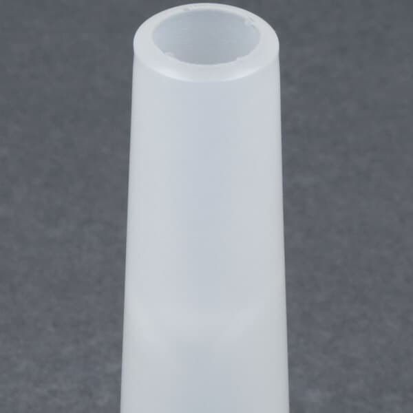 A white plastic cone with a small hole in it.
