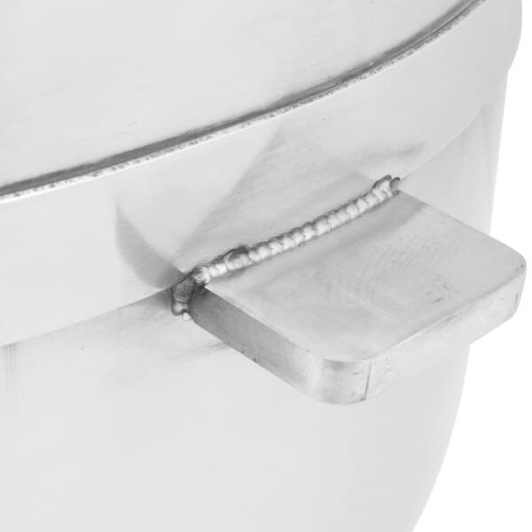 A close-up of a silver metal Avantco 304 stainless steel mixing bowl.