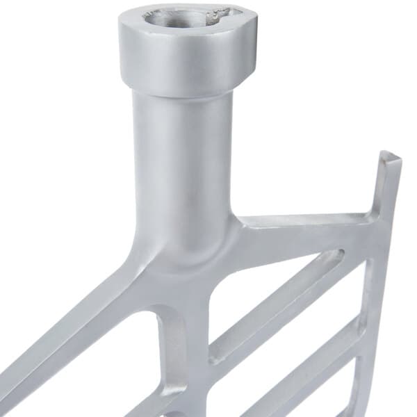 A close-up of a silver metal Avantco flat beater.