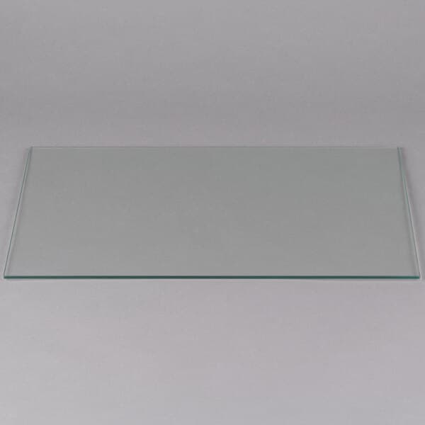 A rectangular glass plate with a black border on a white surface.