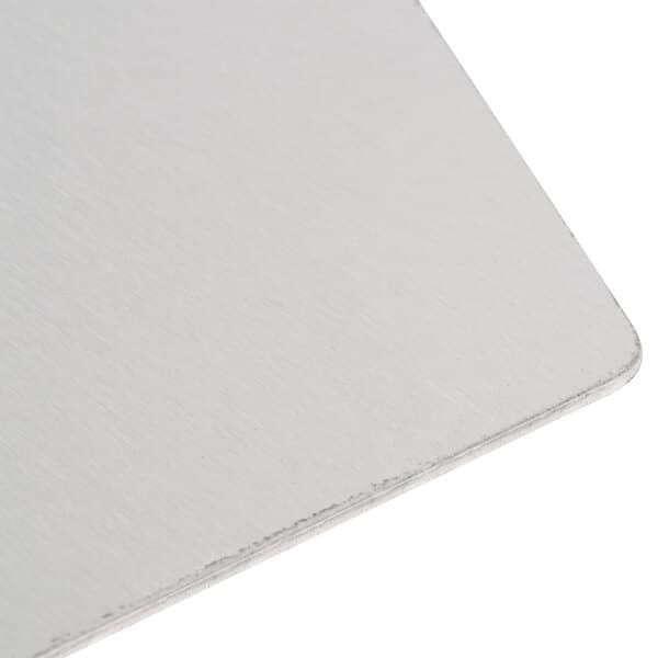 A white metal Avantco separation plate with a silver edge.