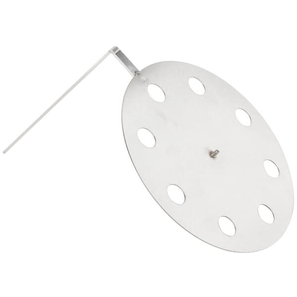 A metal circular steam plate with holes.