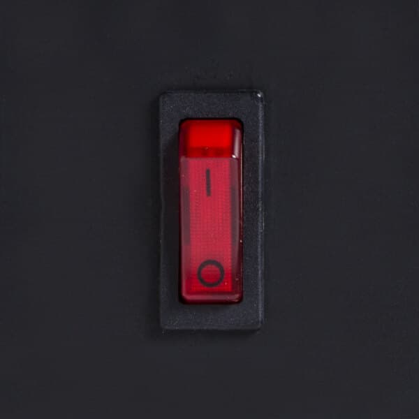 A red switch with a black background.