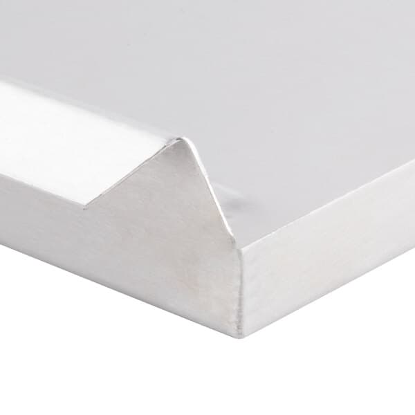 A white metal rectangular tray with a small triangle on top.