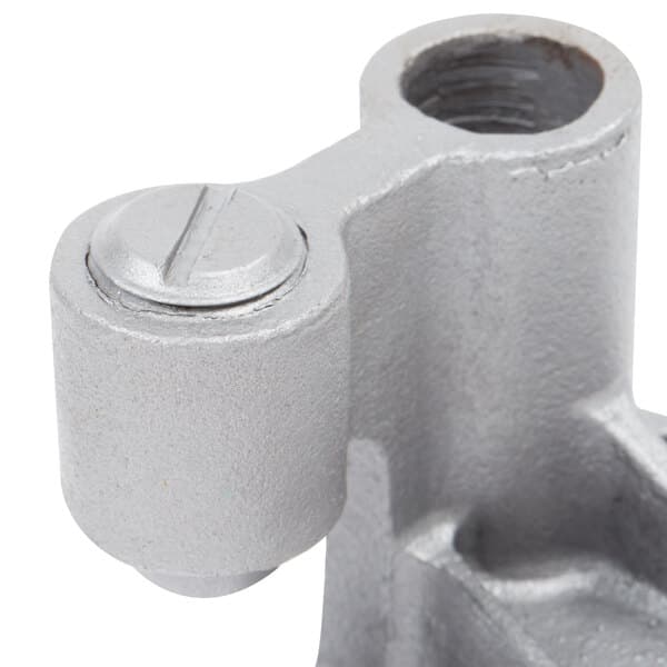 A close-up of an Avantco metal fork bracket with a screw.