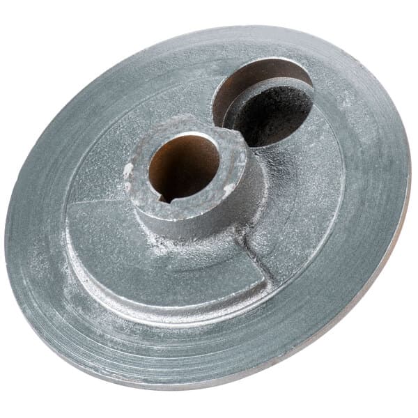 A close-up of an Avantco turning plate, a round metal disc with holes.