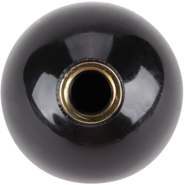 A black ball with a gold metal center.