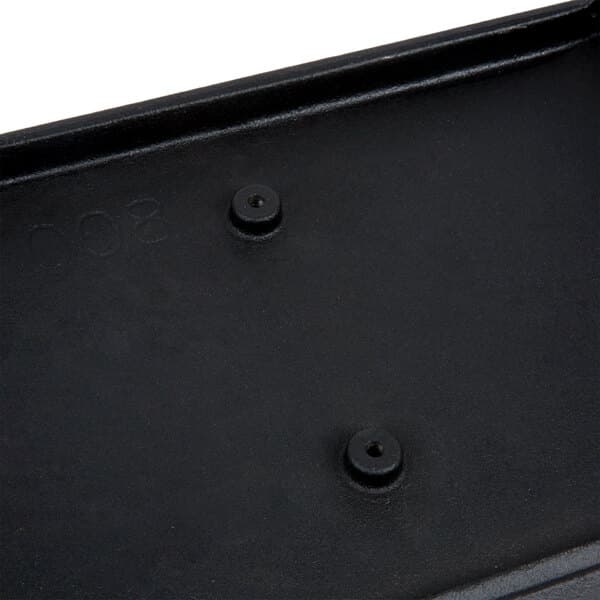 A black rectangular flat top grill plate with screws.