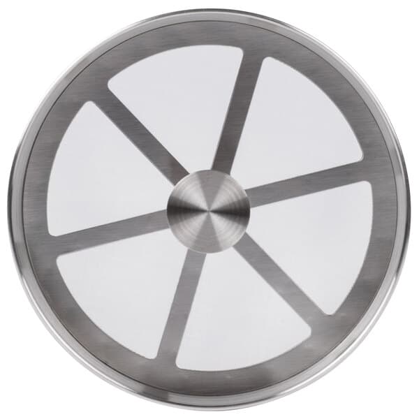 A close-up of a circular metal object with a circular design.