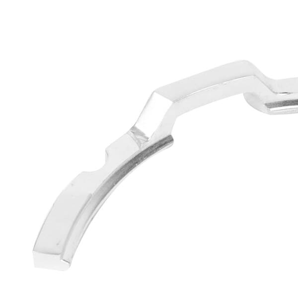 An Avantco silver metal ring with a curved edge.