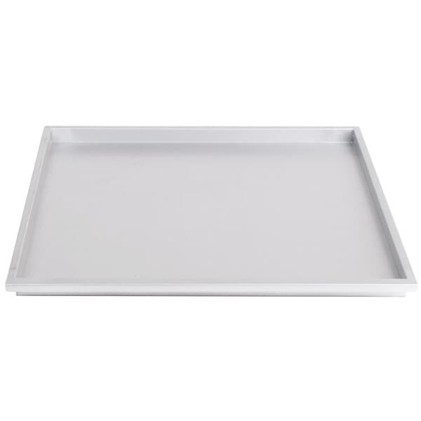 An Avantco white rectangular grease tray.