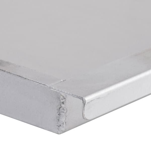 A silver metal grease tray for an Avantco charbroiler.
