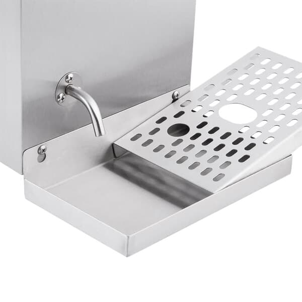 A close-up of a stainless steel Avantco drip tray with a drain.