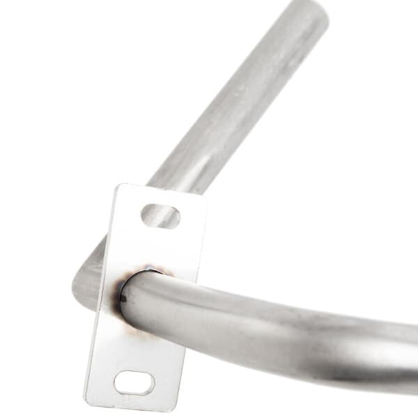 A metal pole with a square hole in it.