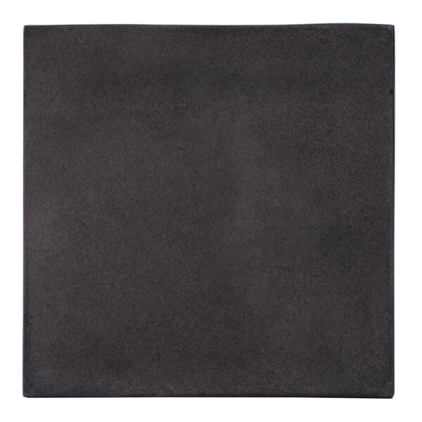 A black square object with white border.