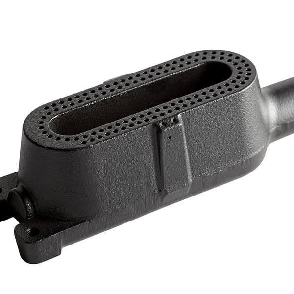 A black metal tube with holes at one end.