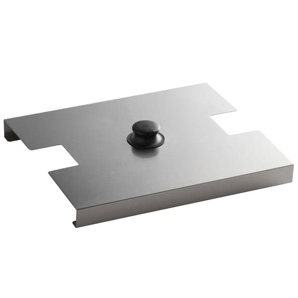 An Avantco metal night cover with a black rubber button.