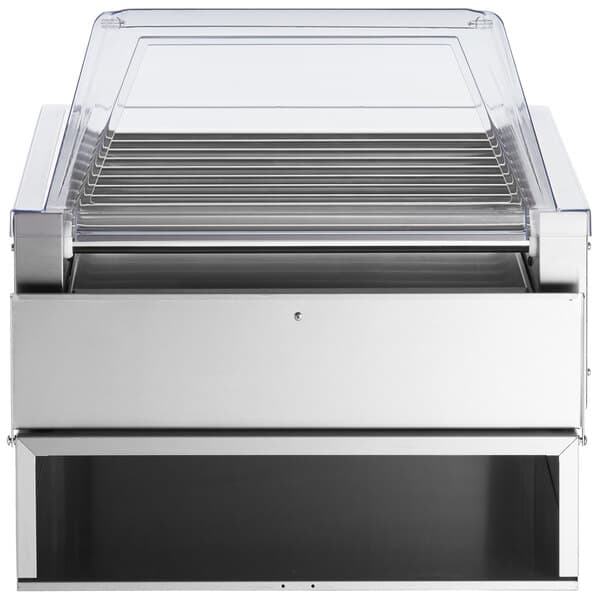 A silver Avantco hot dog roller with a clear sneeze guard.