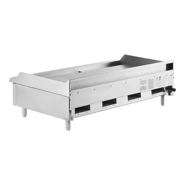 An Avantco stainless steel countertop gas griddle with manual controls.